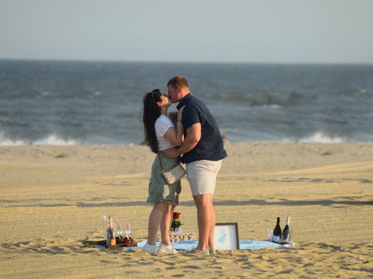 Brian surprised Jess with a romantic proposal on the beach, launching their engagement era!
