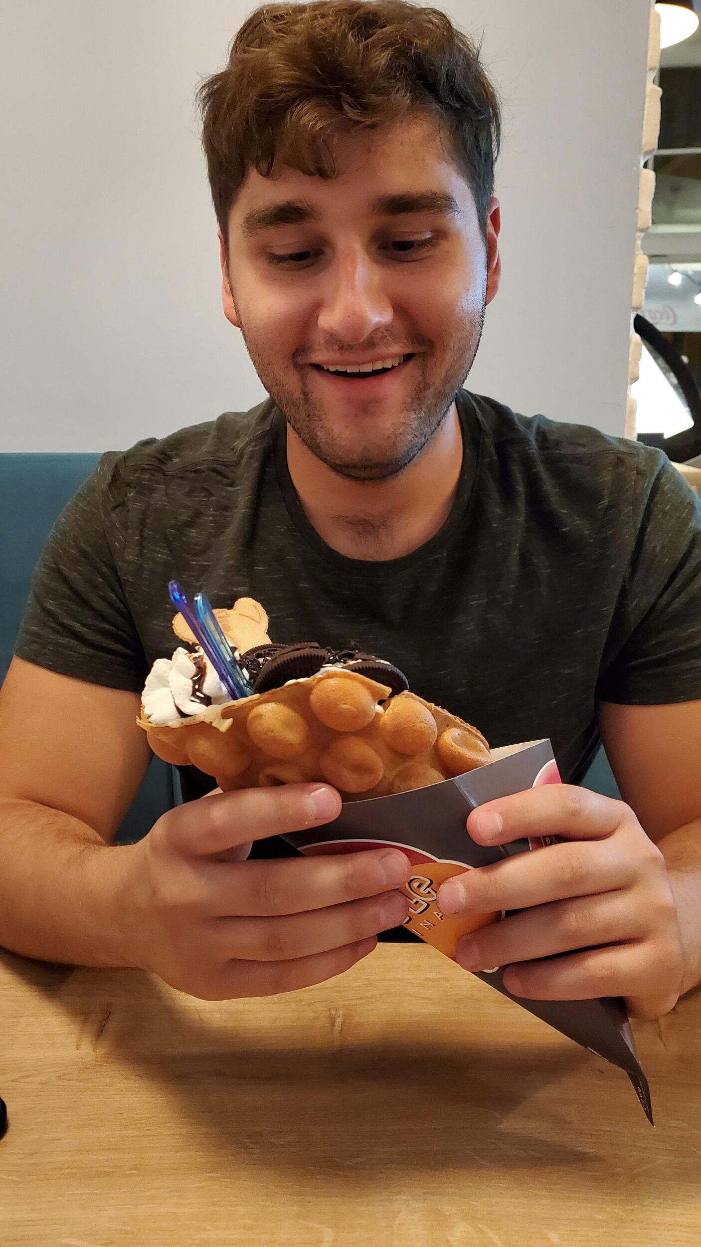 Aaron after realizing in Poland that Bridget was indeed the love of his life (JK, this was his face after buying an ice cream waffle).