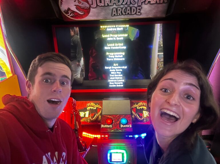 Beating the Jurassic Park game at the arcade.