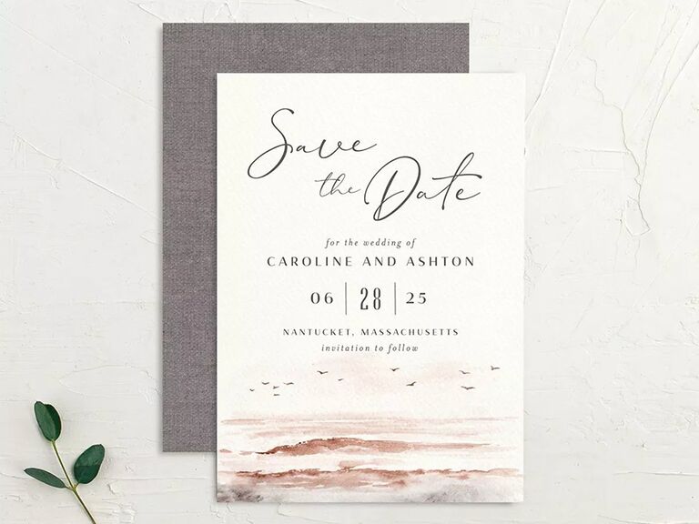 Watercolor beach design on bottom border with 'Save the Date' in calligraphy and type in gray type