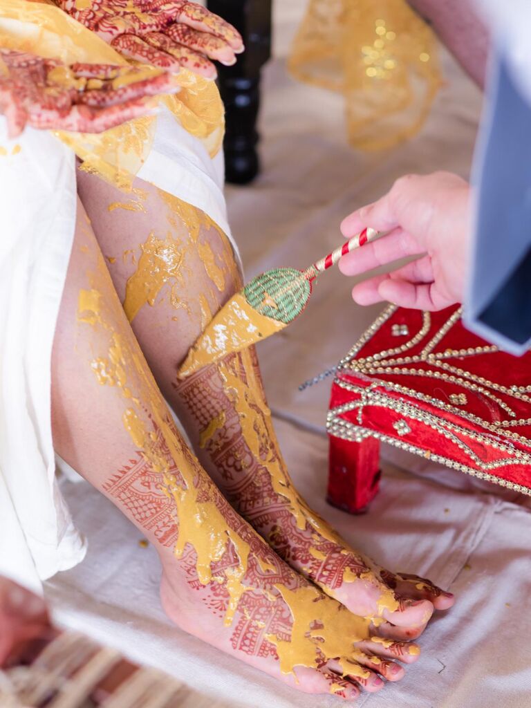 haldi paste application at Indian wedding