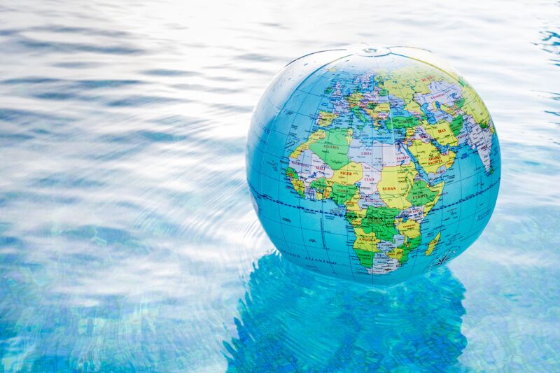 Around the world party theme idea - inflatable globes