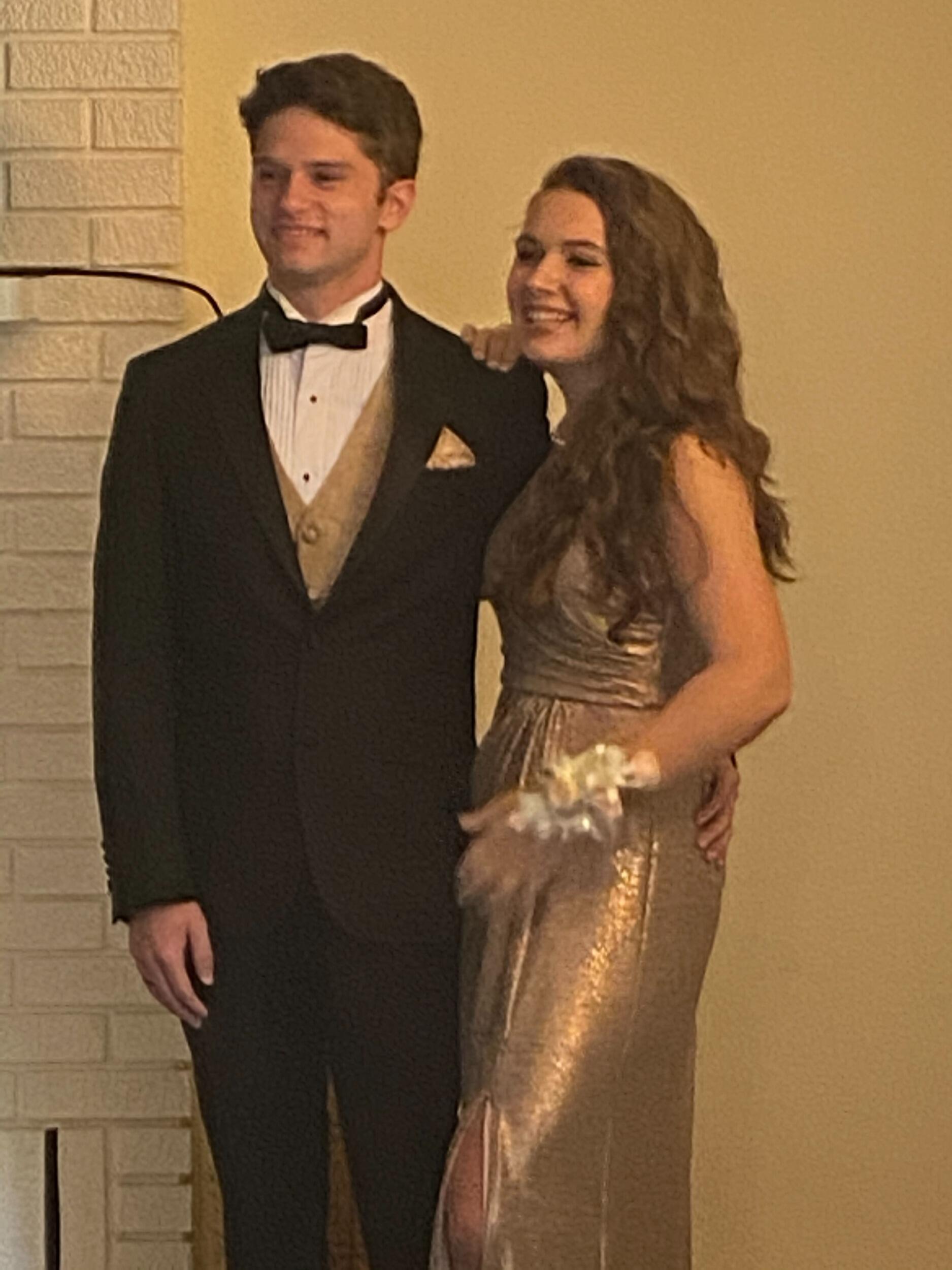 Their one and only prom together! Fun fact: it got canceled like two hours before it was supposed to start because of Covid. They still got dressed up and went out though!