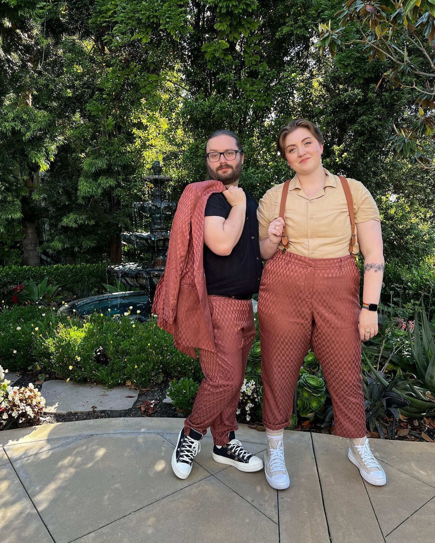 Serving matching suits at a wedding