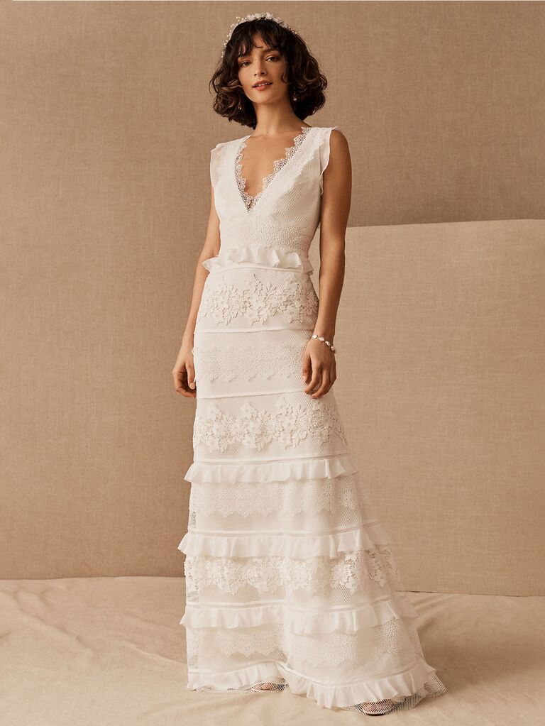 bhldn white sheath wedding dress with v-neckline thick straps with lace trim and tiered skirt with lace and ruffles