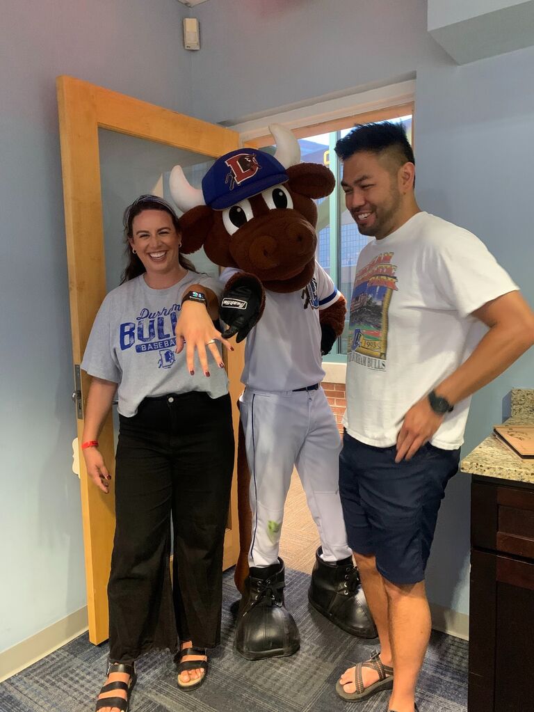 Surprise engagement party at the Durham Bulls game!