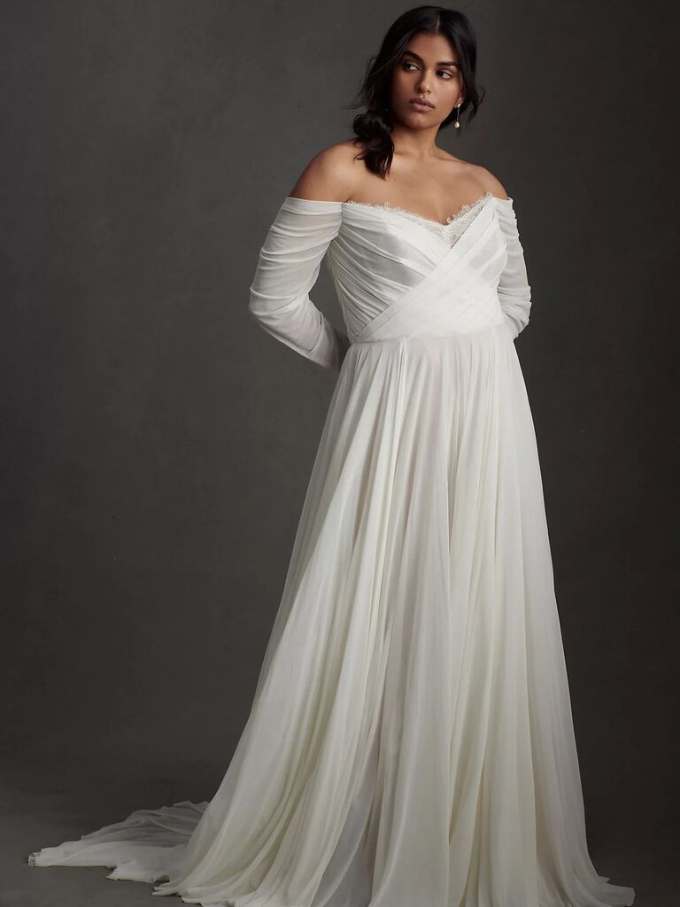 Long sleeved affordable wedding dress by Anthropologie. 
