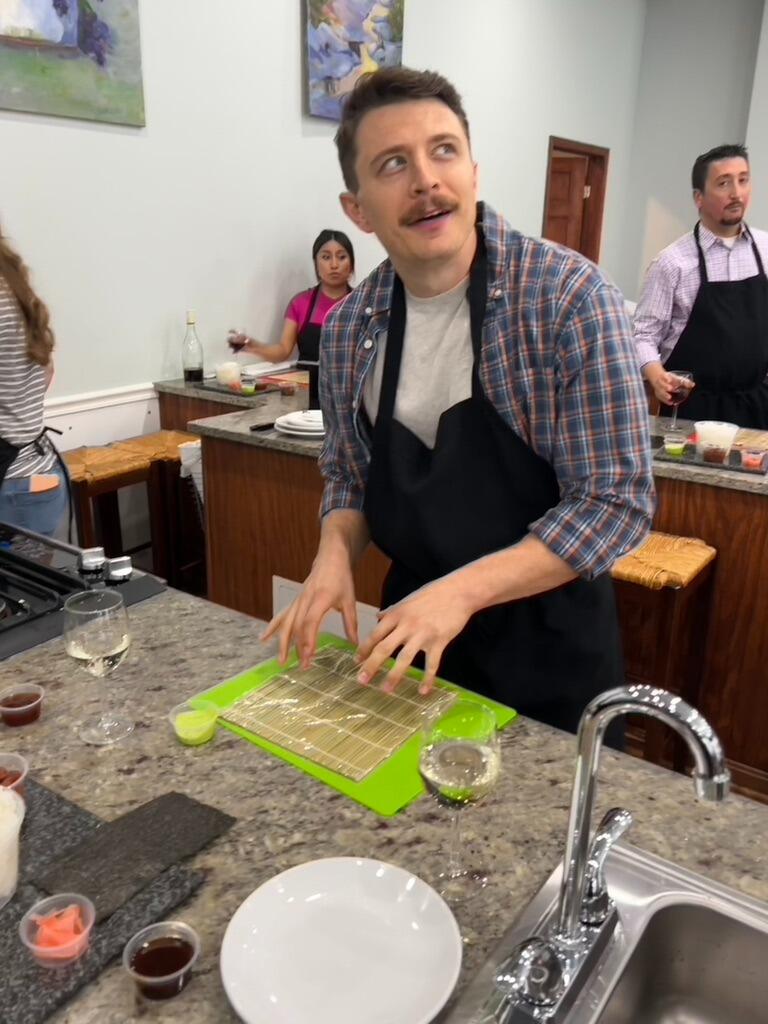 Taking a sushi cooking class. Micah and Kayla were a little stressed after being locked out of the establishment and then being scolded for being late. 