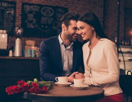 Happy couple on a romantic dinner date