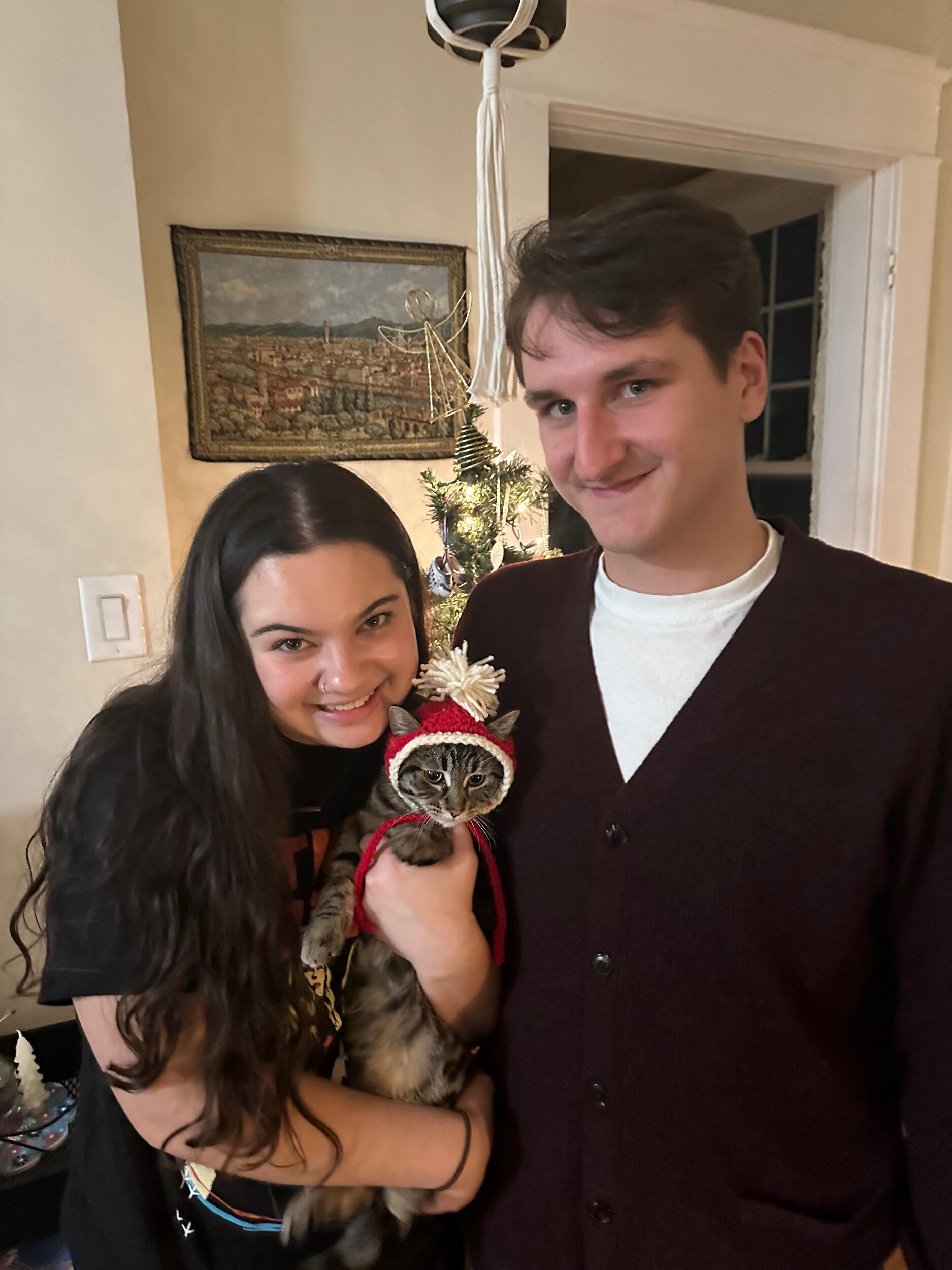 Family photo with our kitty, Juno. 