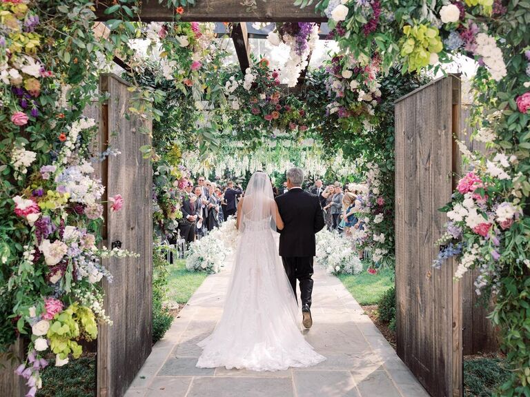 Bride and father walking down the aisle