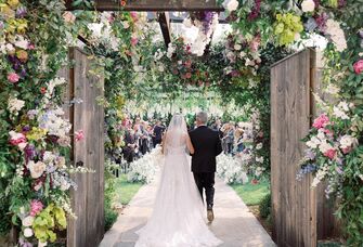 Bride and father walking down the aisle