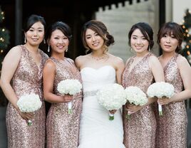 Bride with bridal party in rose gold sequin bridesmaid dresses