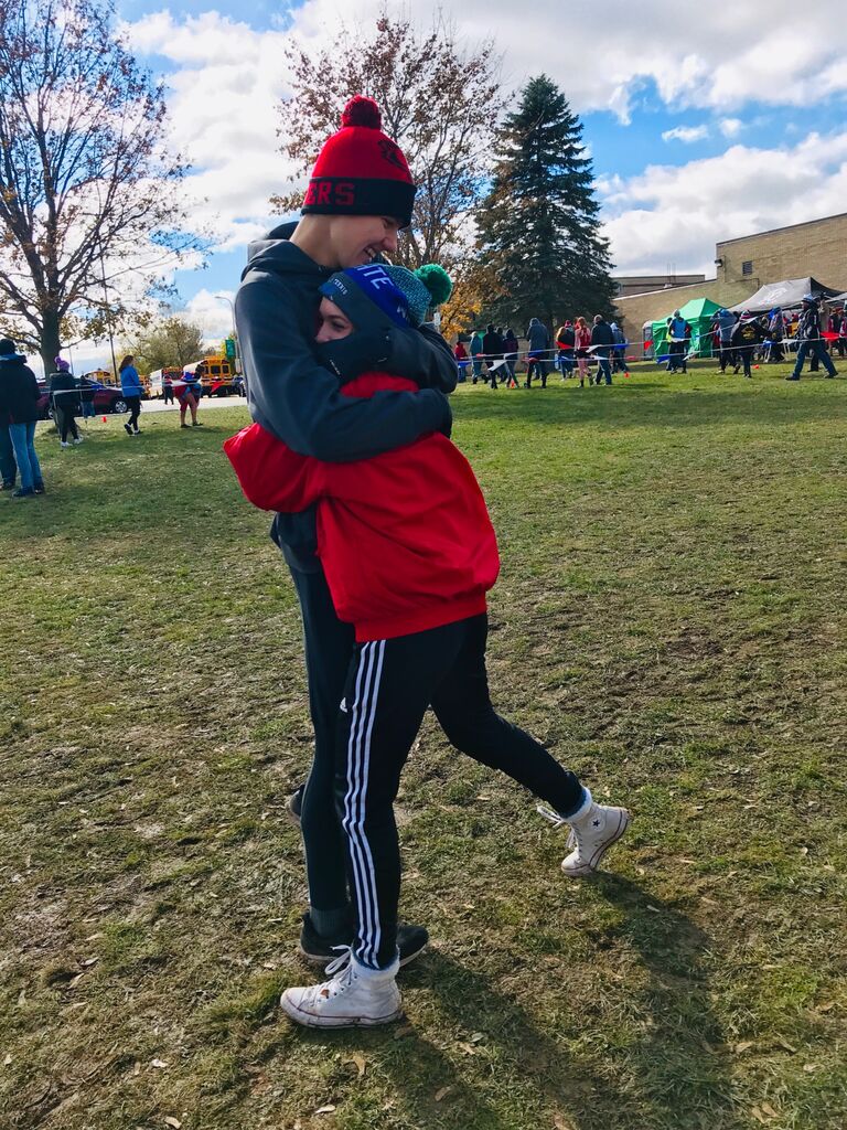 Enya always made sure to support Zach in running, this sectionals meet being one of her favorites.  
