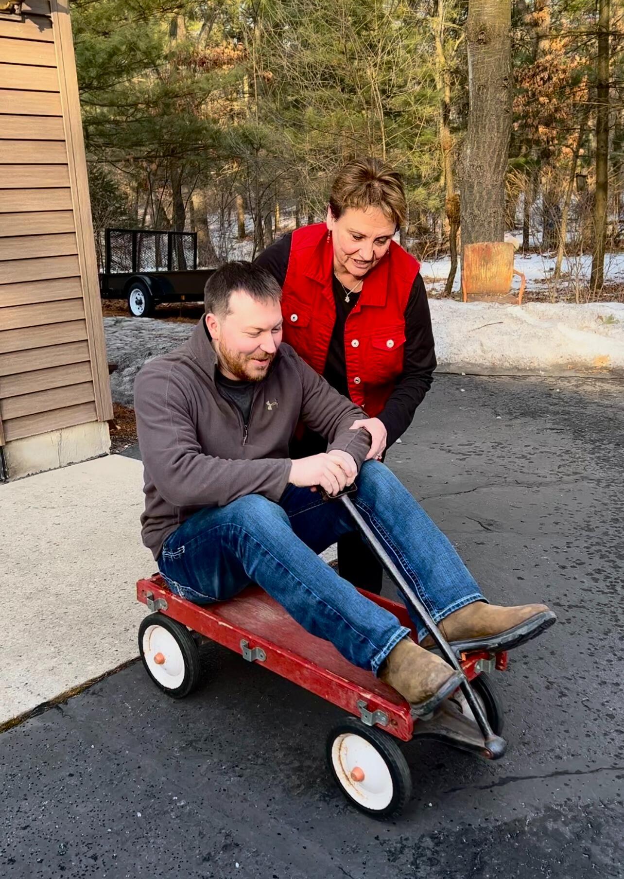 Speaking of traditions - Austin got to join in on one of Lorica's family's most cherished traditions - riding the little red wagon down the long, twisty, winding driveway at Grandma Kathy's!
