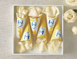 White rose petal confetti cones for wedding ceremony