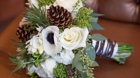 Winter Greenery and Pinecone Rustic Mixed Floral Arrangements - Venue  Marketplace