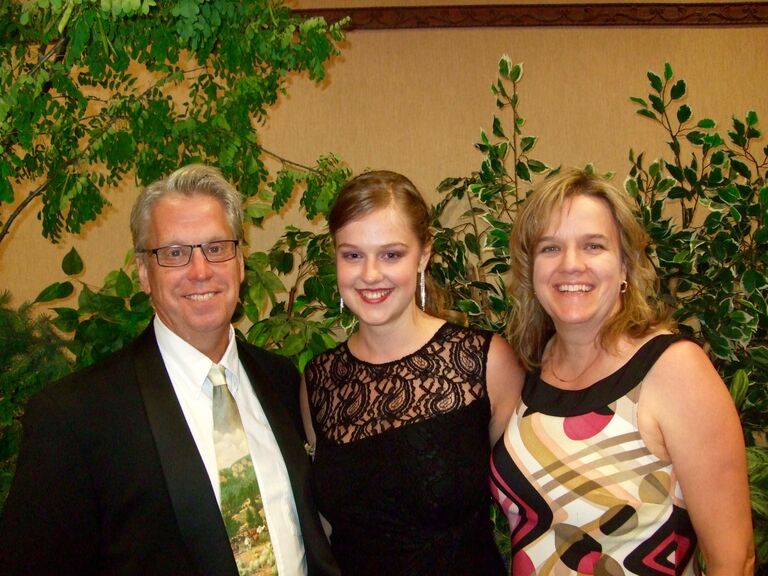 All the hard work paid off for Nat, high school graduation, and valedictorian. What proud parents!