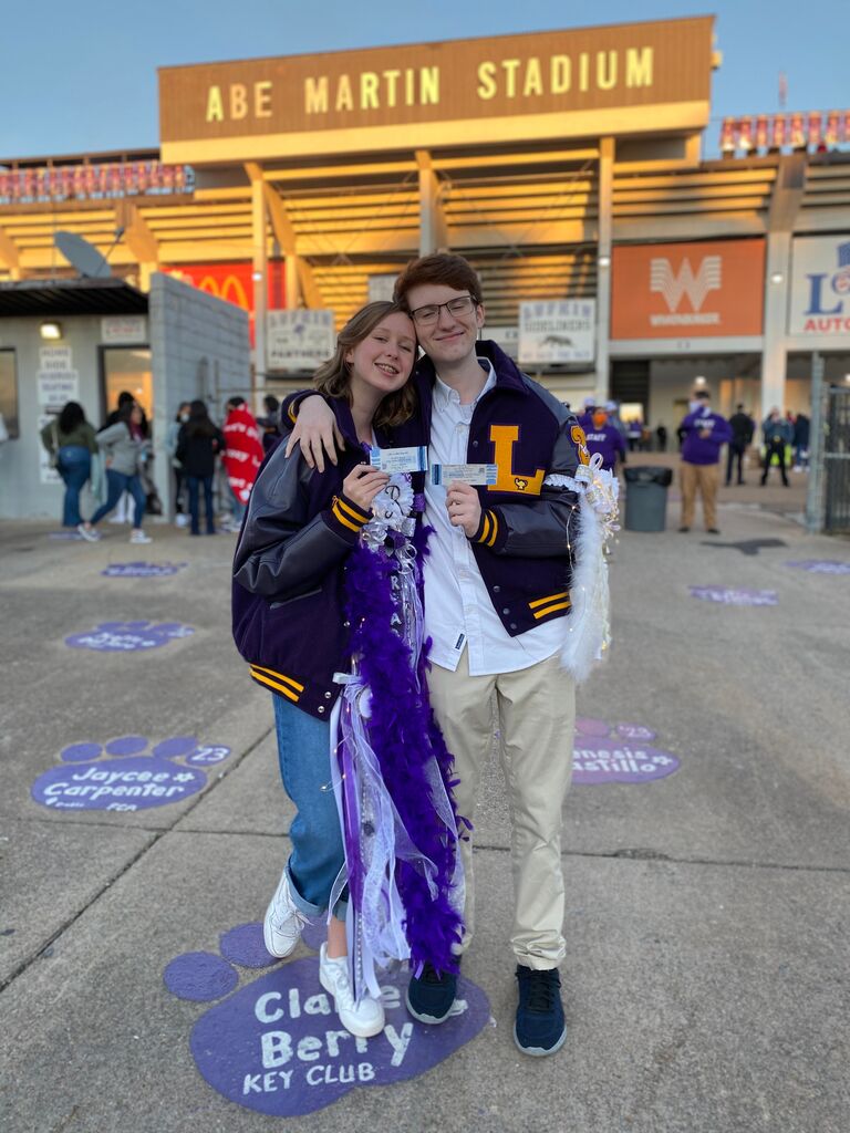 Our first Homecoming! We had so much fun making our own mum and garter.