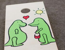 Dinosaur corn hole wedding game