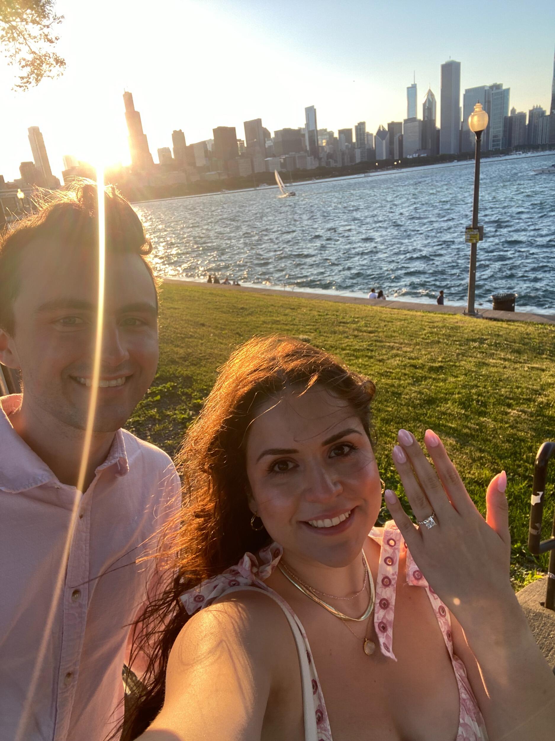 We're engaged!!! It was SOO insanely windy by the lake this day (as evidenced by our hair)
