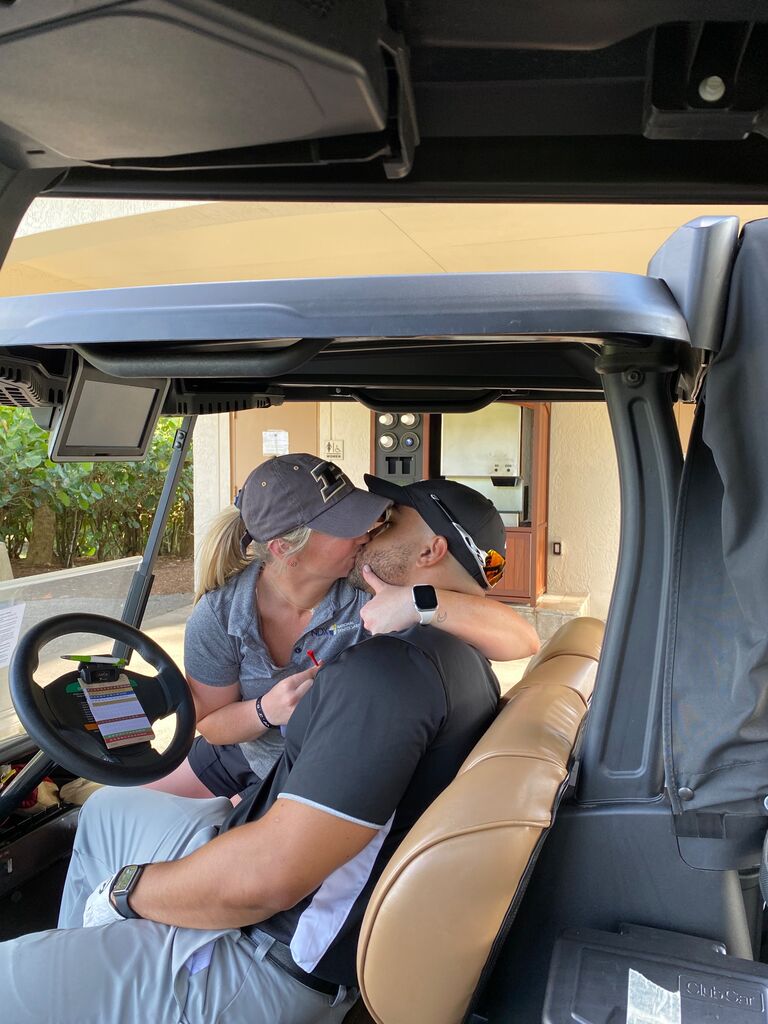 First time Chris showed Carly how to play golf.
