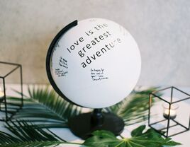 black-and-white globe wedding guest book