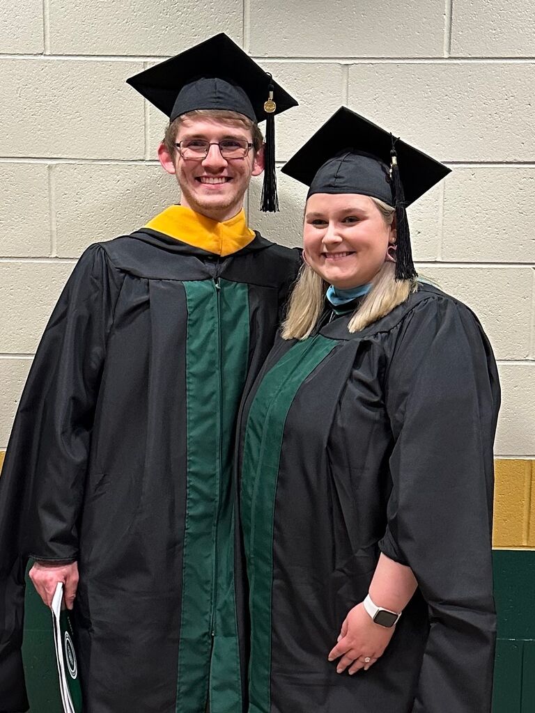We both graduated... again! John received a Master's in Accounting and Taylor received a Master's in Education 🎓