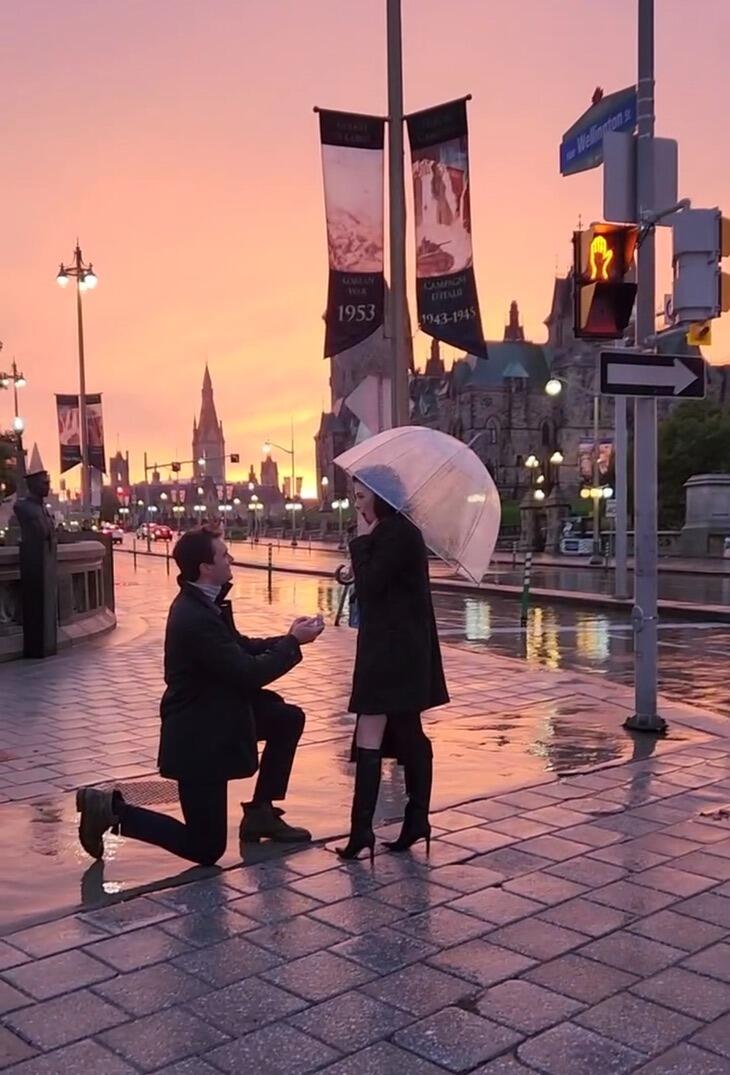 John took me to Ottawa, Canada (for what I thought was a birthday trip) and proposed in front of Parliament Hill. This photo is a screenshot of a video recording taken by a kind stranger. 