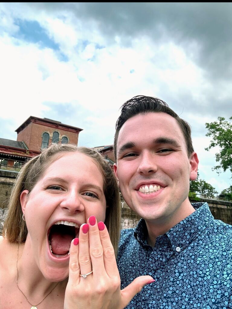 The day Morgan said YES!!!! to spending the rest of her life with Sam in Kent, OH on the same overlook by the river