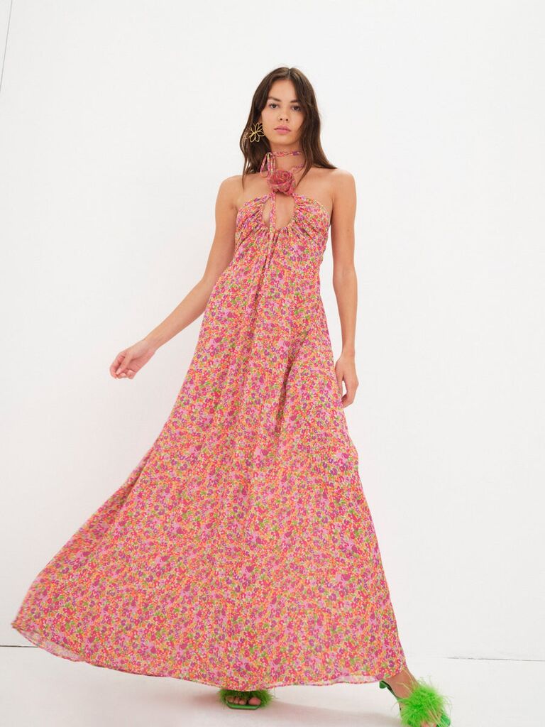Floral maxi dress for a beach wedding by For Love and Lemons. 