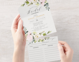 Woman holding floral bridal shower recipe card