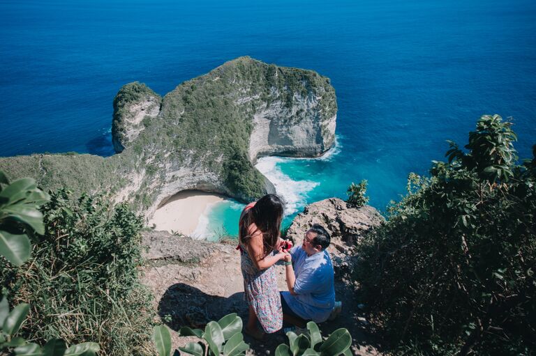 Brian proposed at the famous cliffs of Kelingking Beach at Nusa Penida in Bali Indonesia at exactly 2:30 PM