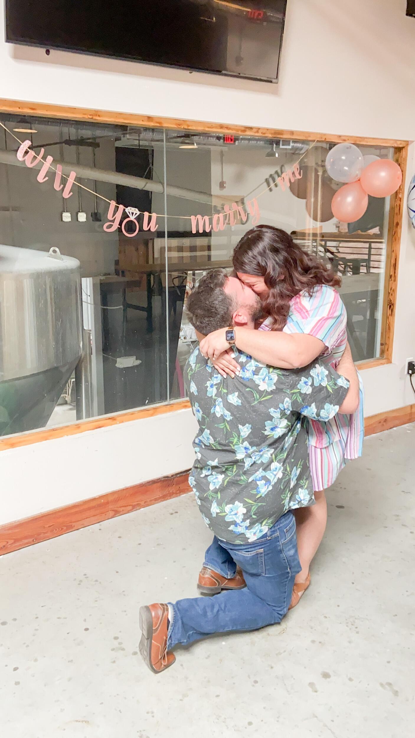 After 3 years and 3 months together, William finally proposed to Megan in the same place that they had their first date. He created a photobook looking back over their years together along with letters that led Megan to the upstairs room of the brewery. There he had set up a banner and balloons, gave a speech (which Megan blacked out for in excitement, thanks Jess for video taping it!), and got down on one knee! After, he swept Megan off to Salsa's, also part of their first date adventure, where family and friends were gathered to celebrate! It was a perfect day! 