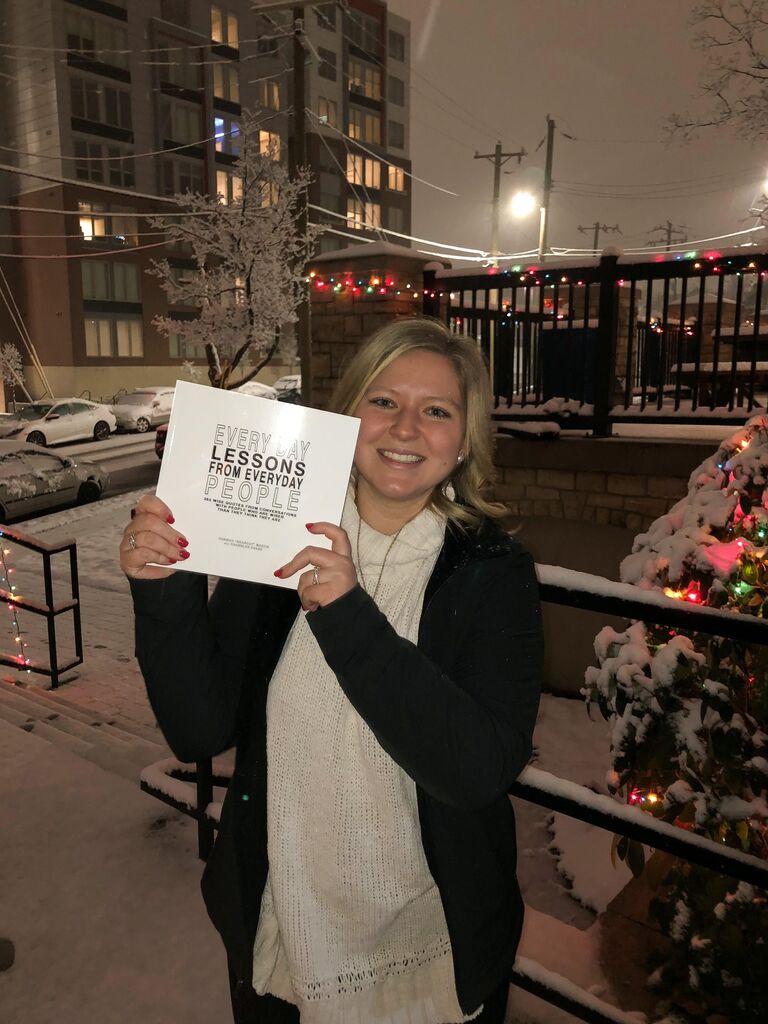 Connor self-published his book, 'Every Day Lessons From Everyday People,' in November of 2019. This photo was taken by Connor on the front steps of Sigma Chi, the day Emily came to pick up her copy.