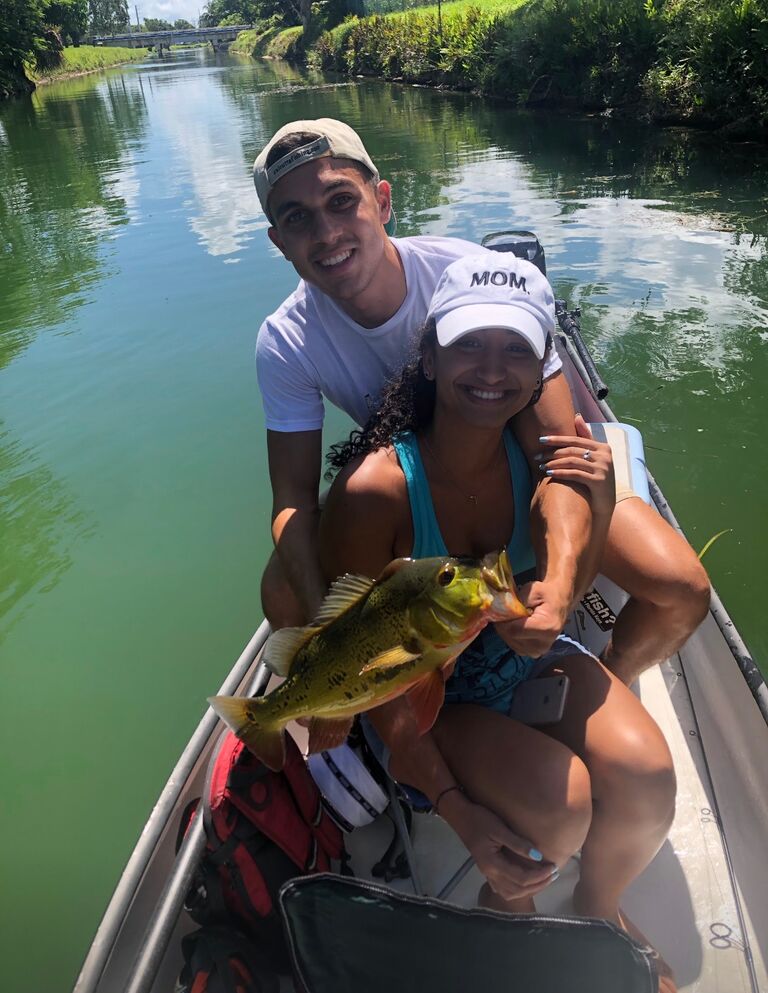 Our first catch while fishing for peacock in the neighborhood canals during sunny afternoons. Claudia didn't care much for fishing at first, but through him, she grew to love it.