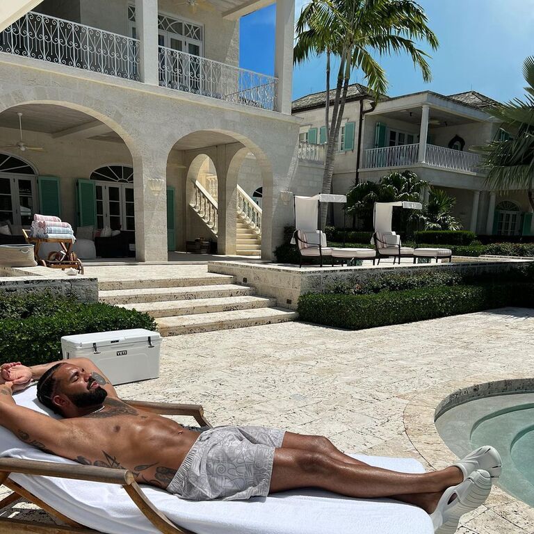 Drake relaxing by the pool