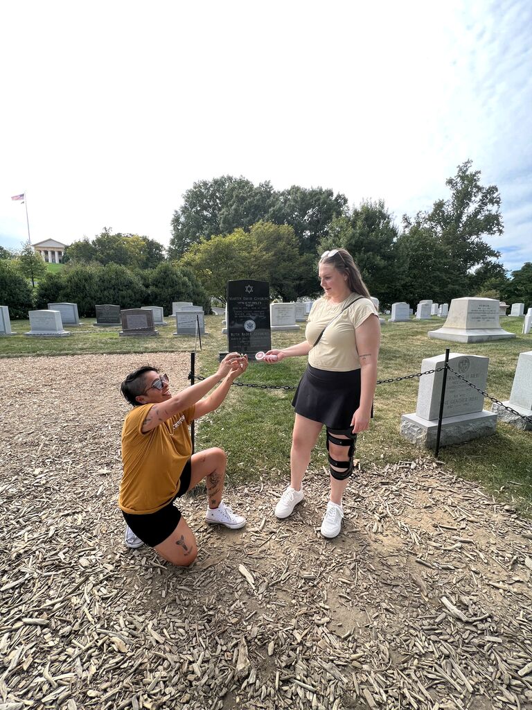 She proposed! While visiting friends in Washington, DC Erika popped the question in front of Ruth Bader Ginsburg's final resting place in Arlington National Cemetery. The Notorius R.B.G. is a prominent figure for both of us as a champion of gender equality and same-sex marriage.