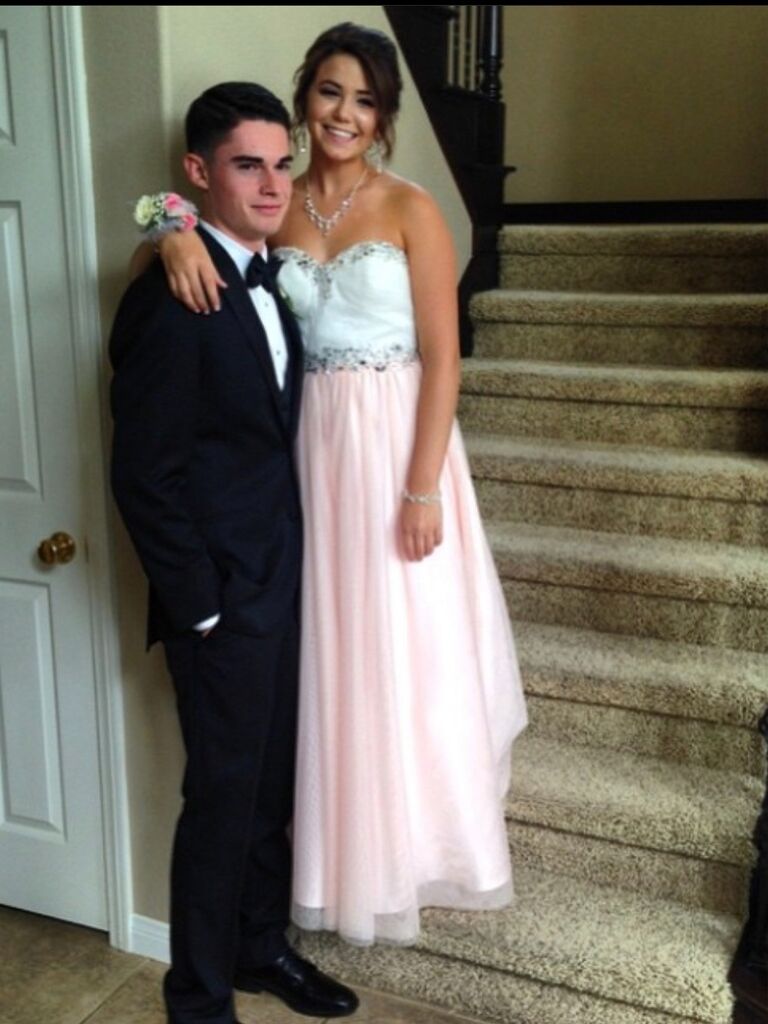 Our senior prom picture! Only a few months into our relationship. We clean up nice, and one of the best days of our lives! 