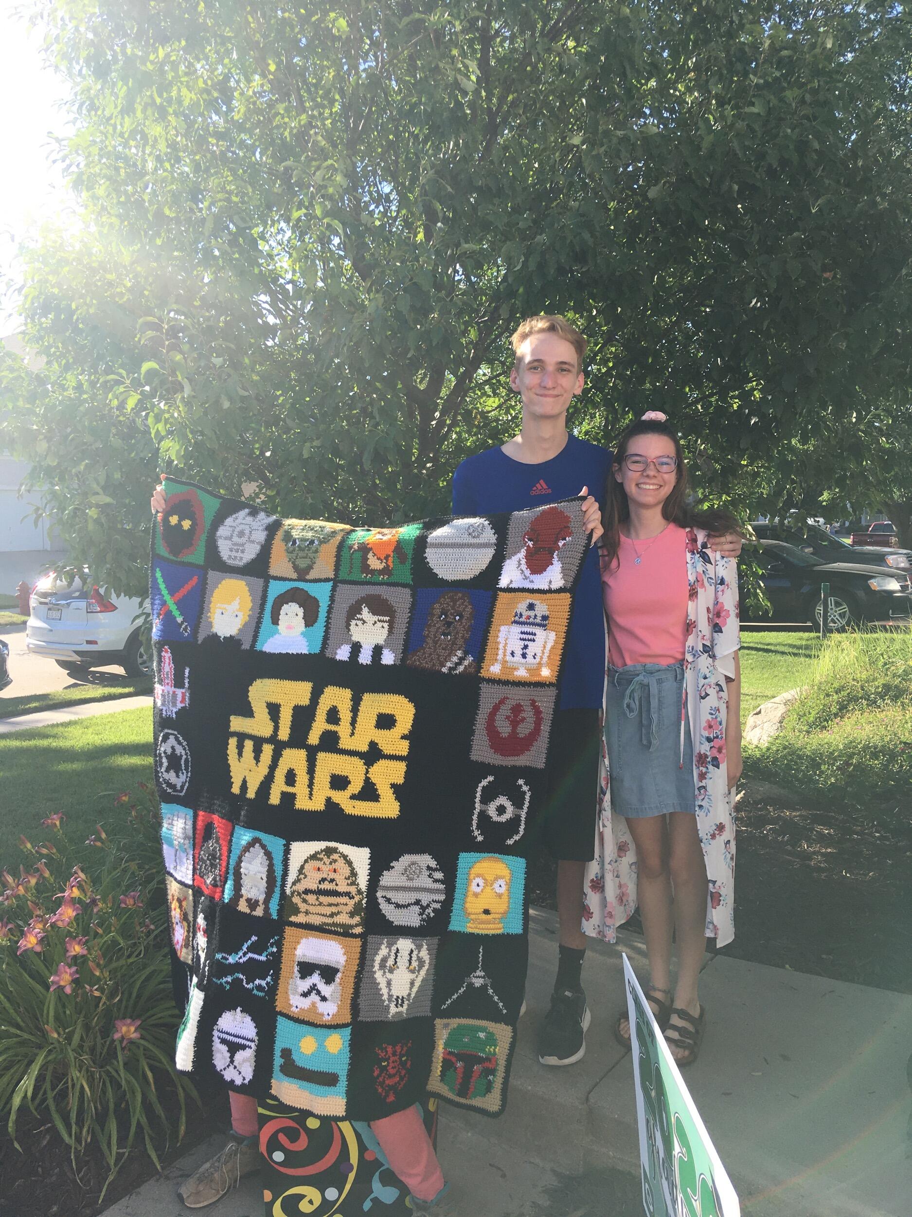 Will graduated high school and Maggie crocheted him this Star Wars afghan for his grad gift!