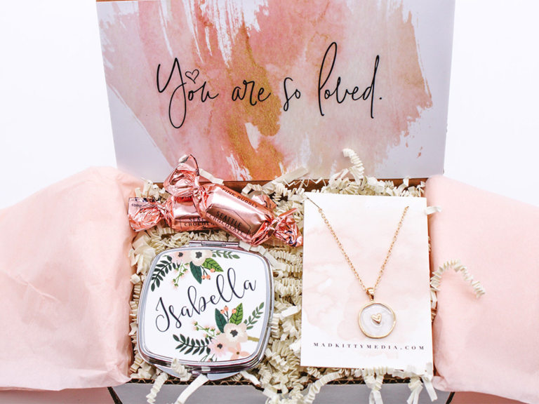 Valentine's gift box in pink and orange featuring truffles, necklace and personalized compact mirror