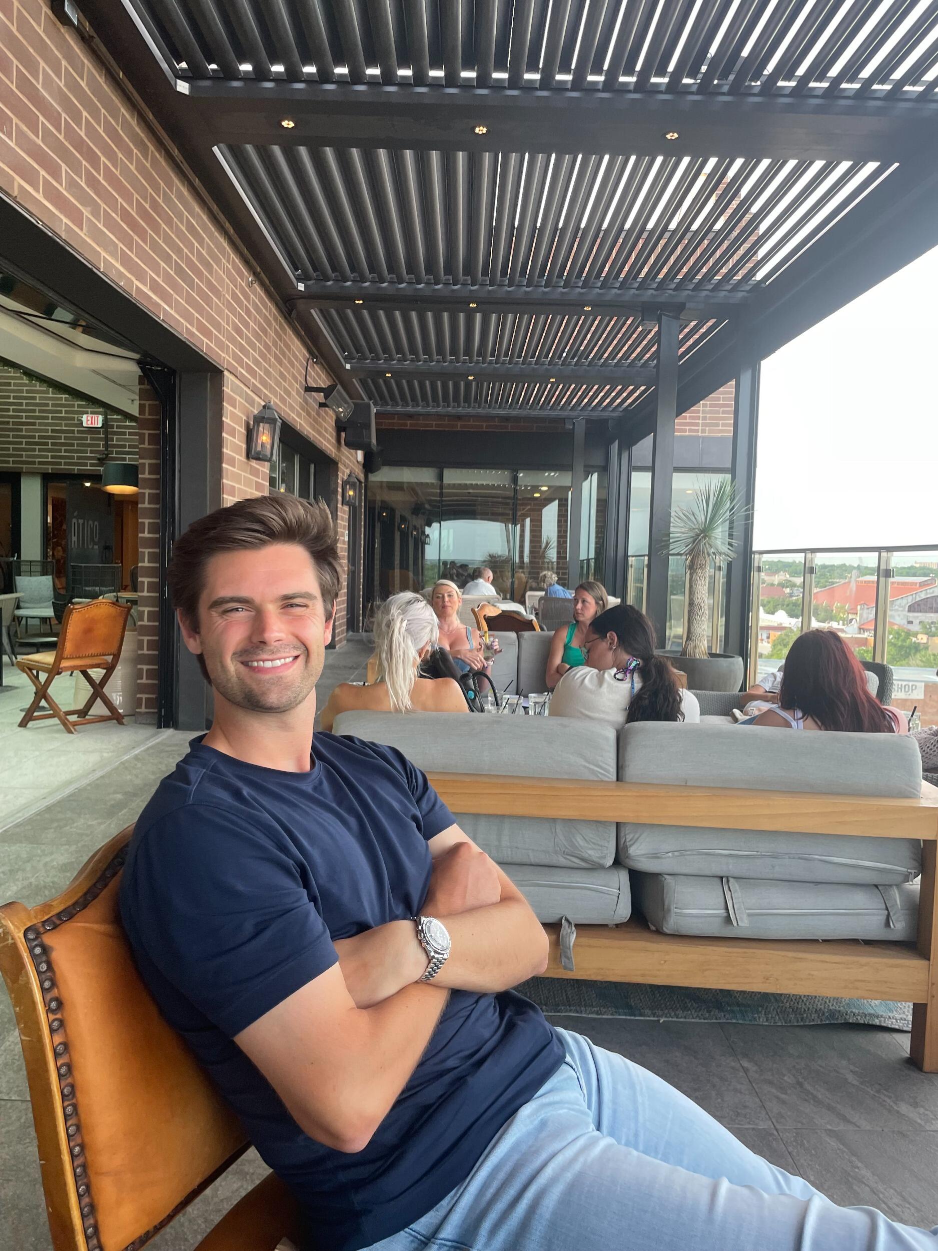 Birthday boy! Celebrating his 26th Birthday at his favorite rooftop bar. Cheers!