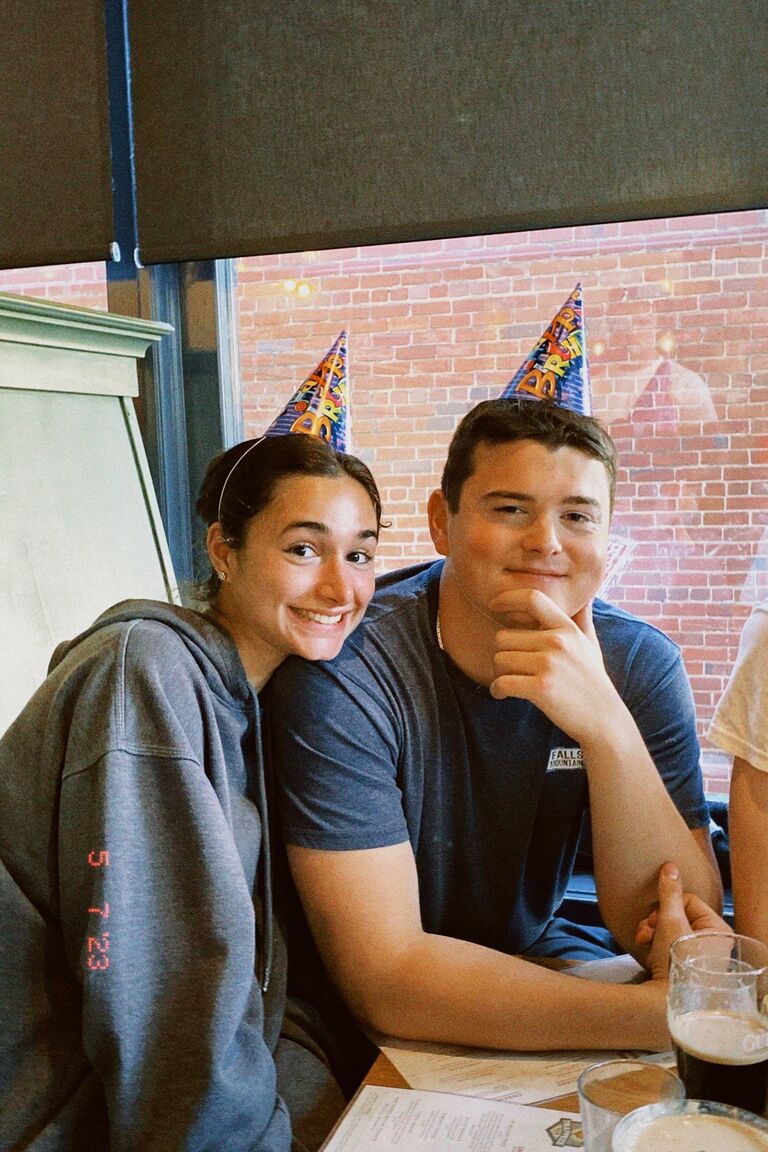 Clark's 22nd birthday dinner! Doesn't he look so cute in his little, cone party hat that Gabby totally didn't make him wear...😏