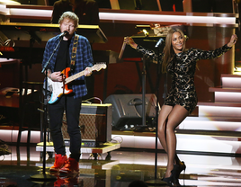 Ed Sheeran and Beyoncé performing onstage