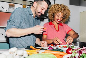 Couple cooking together