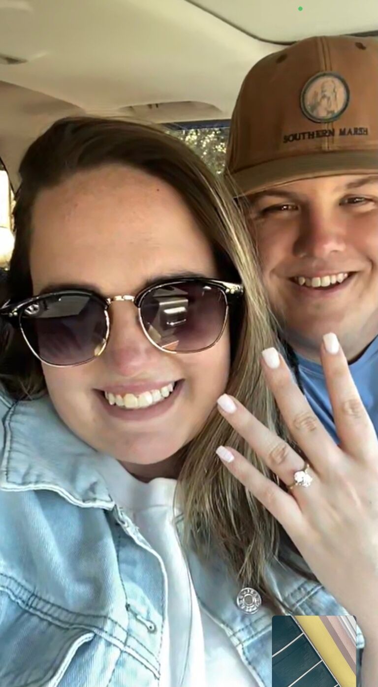 Showing off the new ring to friends