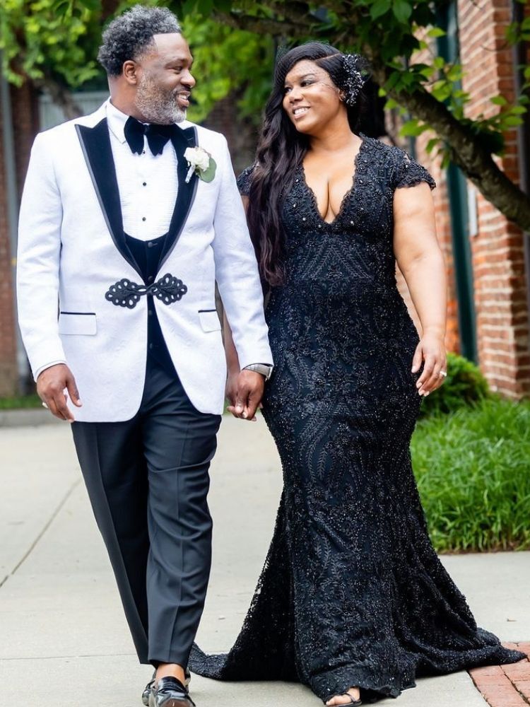 bride and groom in black-and-white attire