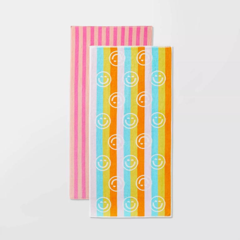 Colorful beach towels with smiling faces and vertical stripes