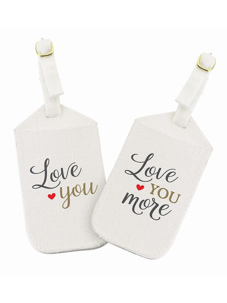 White canvas tags with 'Love you' and 'Love you more' in loopy script with mini red heart