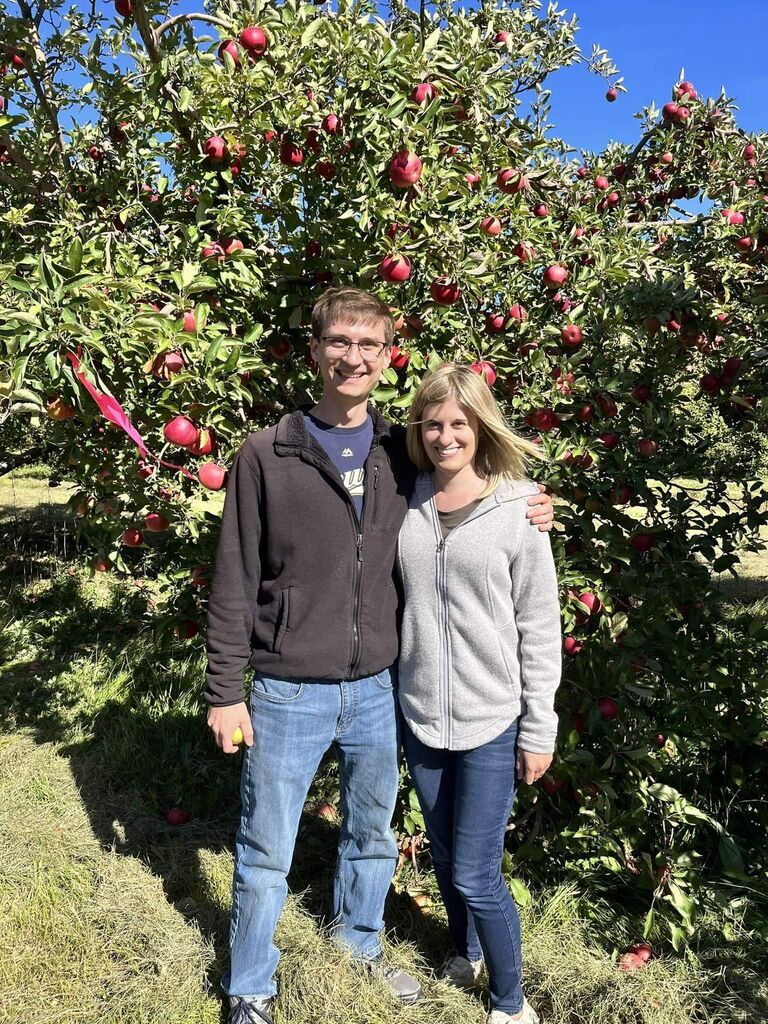 Elegant Farmer Apple Picking